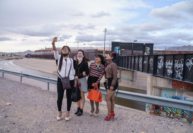 Fernanda poses for a photo with other women from Casa de Colores.